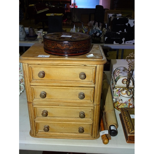 91 - A small carved camphorwood box, 25cm wide, 13cm high, a mahogany two-division tea caddy, two nests o... 