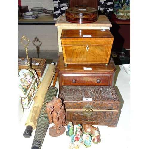 91 - A small carved camphorwood box, 25cm wide, 13cm high, a mahogany two-division tea caddy, two nests o... 