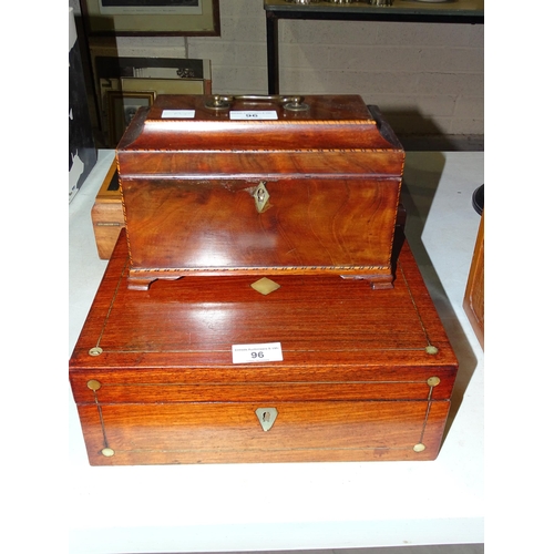 96 - A 19th century mahogany tea caddy, (interior lacking), 22.5cm wide, 15cm high and a mahogany needlew... 