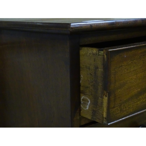 1 - A large Georgian mahogany bow-front chest of three short and four long cockbeaded drawers, on bracke... 