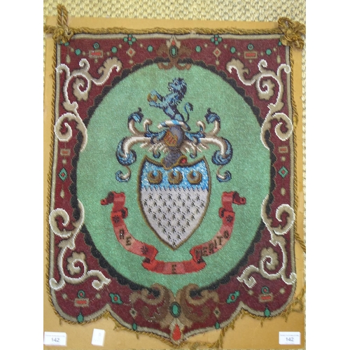 142 - An unframed beaded coat of arms, 59 x 45cm.