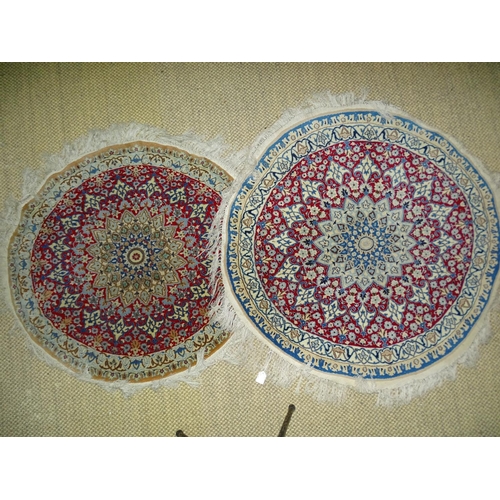 24 - Two modern circular Oriental rugs, 130cm diameter and 120cm diameter and three other small Oriental ... 