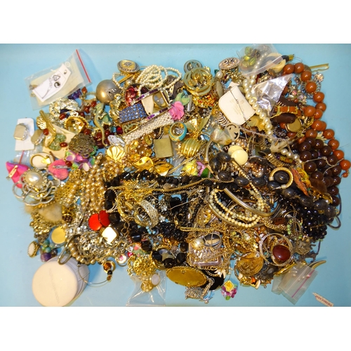 82 - A large quantity of costume jewellery, including leaf and butterfly brooches, beads and other jewell... 