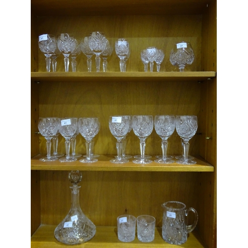 60 - A part-suite of Edinburgh crystal drinking glasses in the 'Royal' pattern, comprising eight wine gla... 
