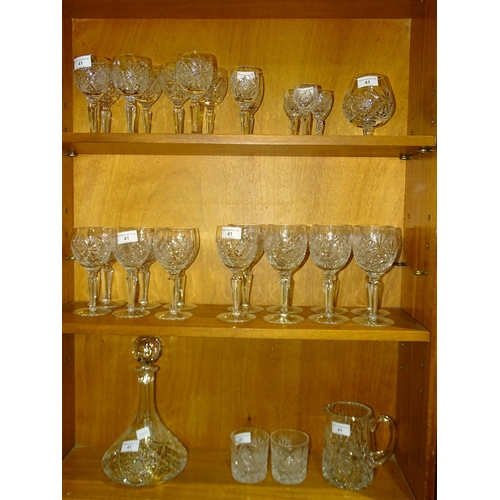 60 - A part-suite of Edinburgh crystal drinking glasses in the 'Royal' pattern, comprising eight wine gla... 
