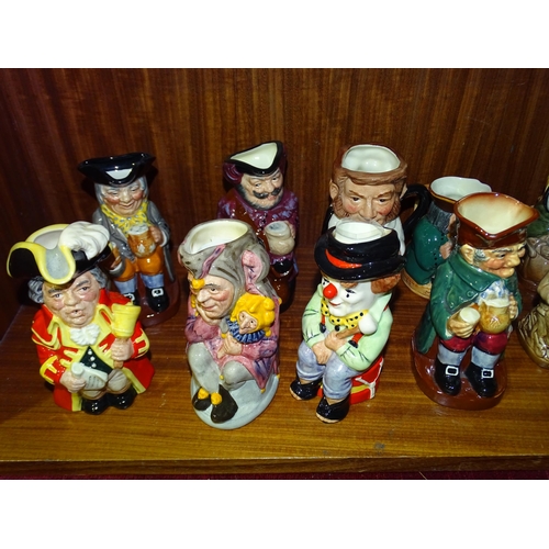 100 - A collection of Royal Doulton small Toby jugs, including 