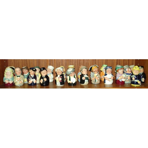 101 - A collection of Royal Doulton small character jugs, 