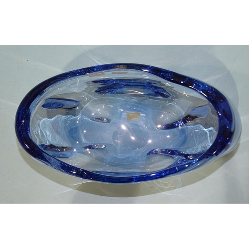 63 - A Whitefriars heavy blue glass bowl designed by James Hogan, pattern no.9250, 27cm wide, 15cm high.... 