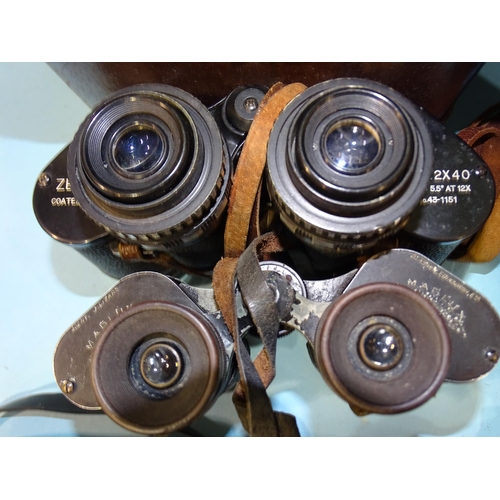 83 - A collection of nine pairs of binoculars: Canon 7x50 no.25521, Zenith Zoom 7x-12x40, Swift Belm... 