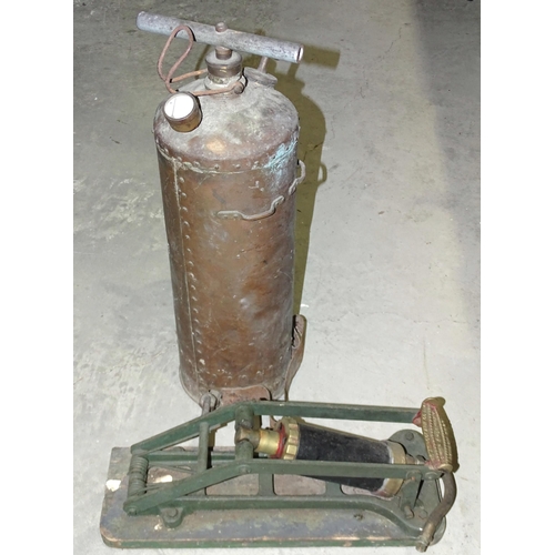 85 - A brass Dunlop foot pump, various other pumps and sprayers.