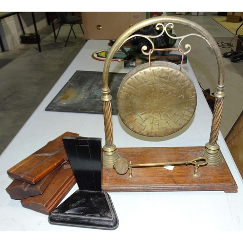 87 - A brass gong on stand, with beater, and other items.