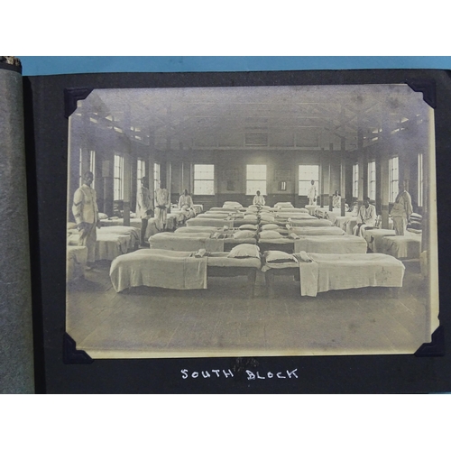 114 - An early-20th century album of twenty-two 12 x 16cm photographs of a hospital, staff and surrounding... 