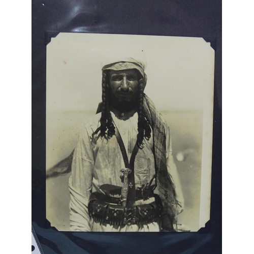 115 - An album of 192 (approx.) photographs of mainly African tribes people, including early-20th century ... 