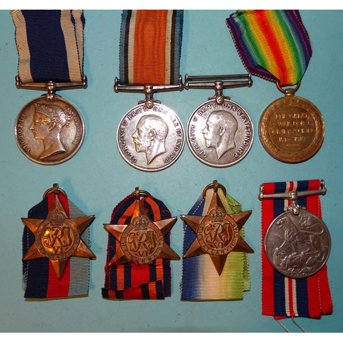 172 - A family group: a VR Long Service and Good Conduct Medal awarded to J Burke P.O. 1Cl HMS Vivid and L... 