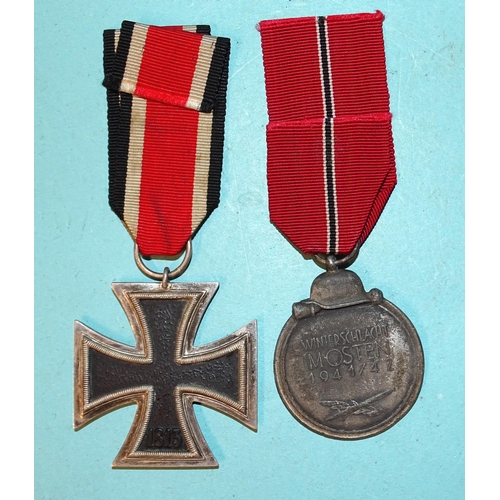 231 - A WWII Iron Cross (2nd Class) and a 1941-42 Eastern Front Medal, (2).