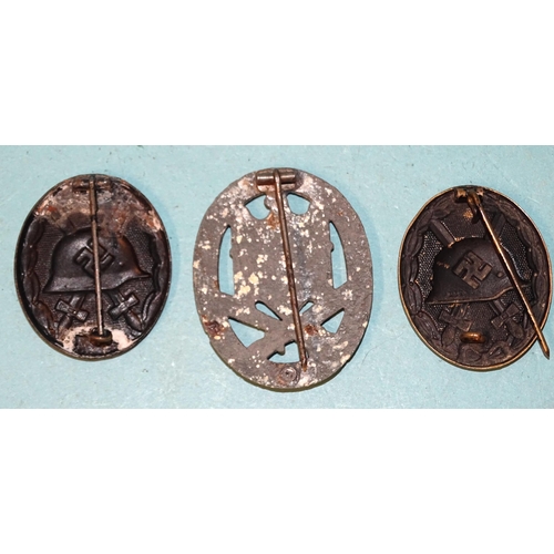 234 - A WWII German General Assault badge and two wound badges, (3).