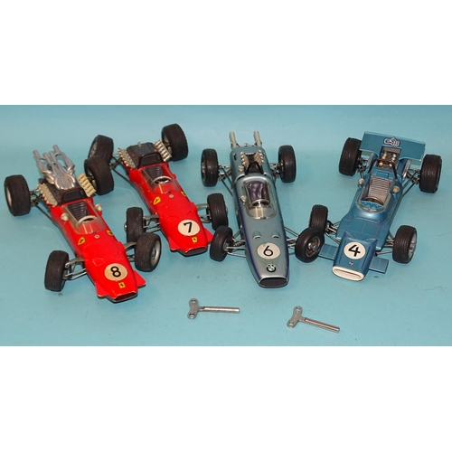 279 - Four Schuco large-scale racing cars: two 1073 F2 Ferraris (one a/f), 1072 F2 BMW and 1074 F1 Matra-F... 