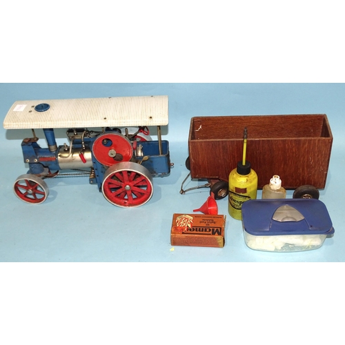 282 - A Wilesco Nol Old Smokey live steam tractor with wooden trailer and fuel tablets, etc.... 