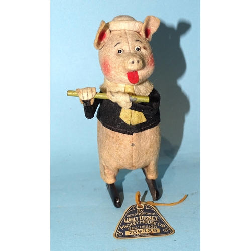 285 - A Schuco for Walt Disney c/w felt-covered tinplate pig playing a flute c1930's, 12cm high, with orig... 