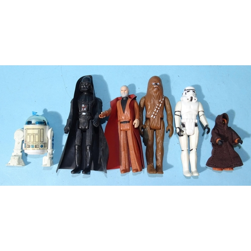 302 - Star Wars, six 1977 action figures: Obi-Wan Kenobi, Darth Vadar, Chewbacca, R2D2, (one leg detached)... 