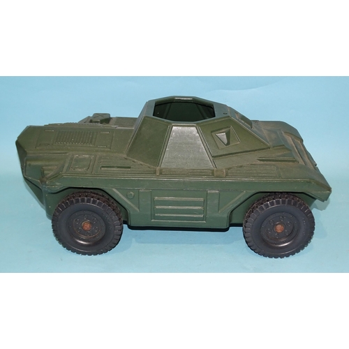 310 - A Hasbro US four-seater armoured car, a 1/6th-scale field gun and another armoured car, (3).... 