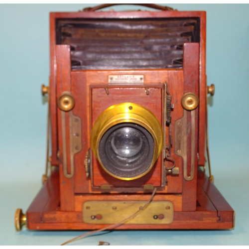 365 - A mahogany and brass half-plate bellows camera 