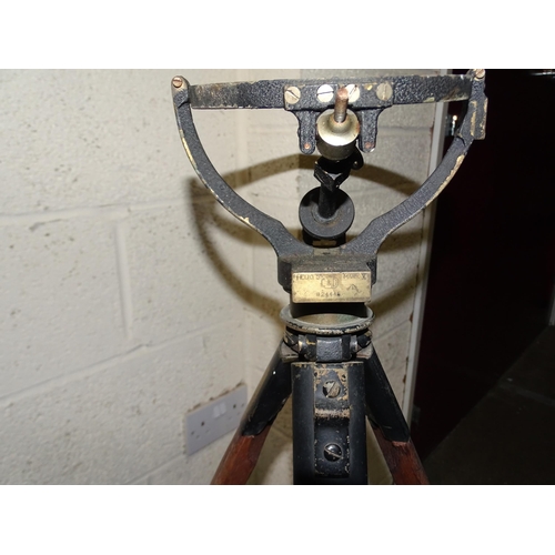 382 - A military wood and brass tripod, marked with broad arrow and Helios Mark V, C&D, B244... 