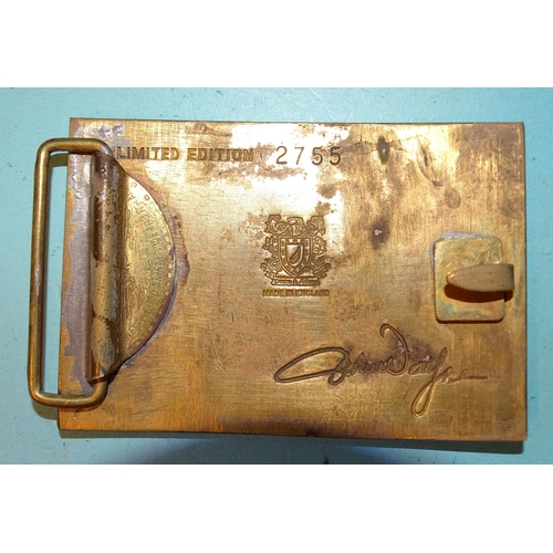 449 - A John Wayne belt buckle stamped 