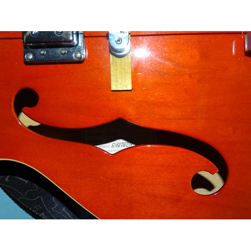 463 - A Gretsch Electromatic semi-acoustic guitar, model G5120, in Epiphone case, made in Korea, no. KS090... 