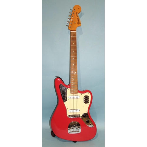 466 - A Fender Jaguar, made in Mexico, with pink and cream body, no.MX18001423.