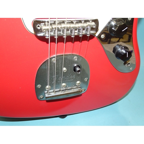 466 - A Fender Jaguar, made in Mexico, with pink and cream body, no.MX18001423.