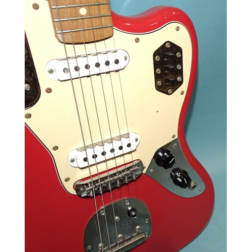 466 - A Fender Jaguar, made in Mexico, with pink and cream body, no.MX18001423.