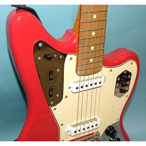 466 - A Fender Jaguar, made in Mexico, with pink and cream body, no.MX18001423.