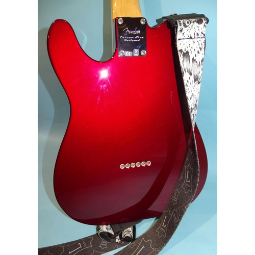 467 - A Fender Telecaster, made in Mexico, with metallic red and cream body, no.MX14468249.... 