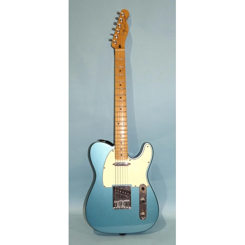 469 - A similar guitar, made in Mexico, with blue and cream body, no.MZ9368219.