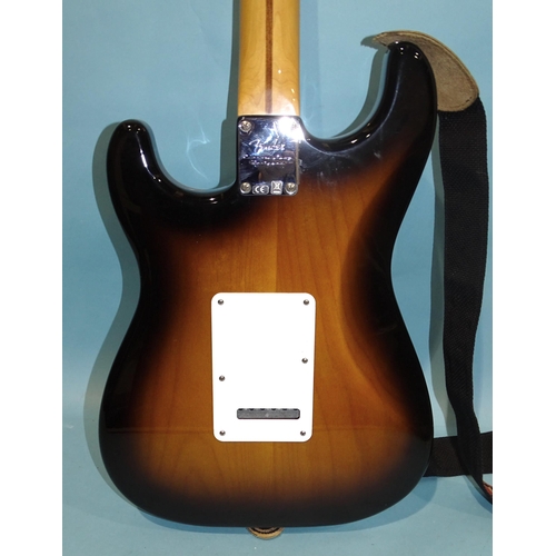 470 - A Fender Stratocaster with original contoured body, made in Mexico, (with synchronised tremolo), woo... 