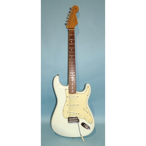 471 - A similar guitar, with pale blue and cream body, Sync Trem no.MZ9443816.