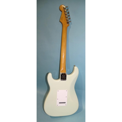 471 - A similar guitar, with pale blue and cream body, Sync Trem no.MZ9443816.