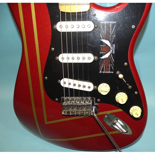 472 - A similar guitar, with striped metallic red and black body, made in Mexico, no.MN4150556.... 