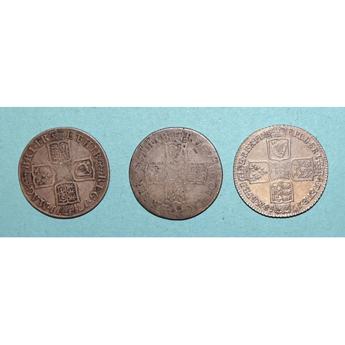 141 - Two Queen Anne shillings: 1707 (Edinburgh Mint) and 1711, with a George II 1758 shilling, (3).... 