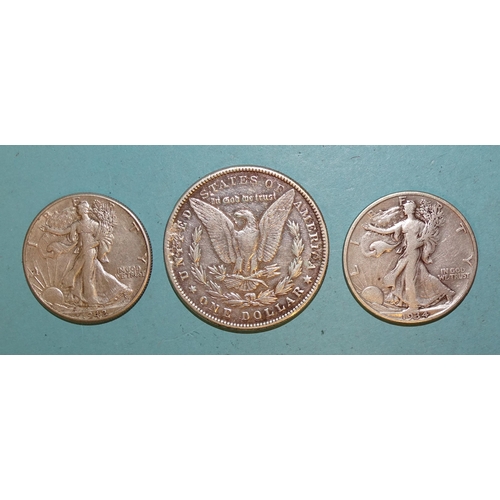 154 - A USA 1884 silver dollar coin, two half-dollars 1934 & 1942, other coinage and a small collectio... 