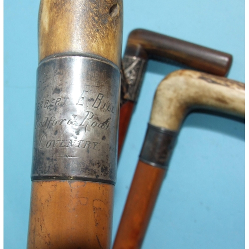 401 - A Malacca and stag antler-handled walking cane, the silver collar marked 