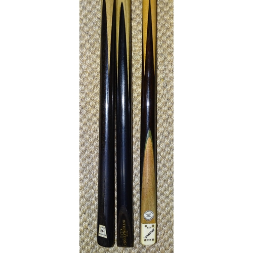 358 - A collection of three snooker cues: a Riley Trapezium badge handmade cue, 17oz, 57½'', a Thur... 