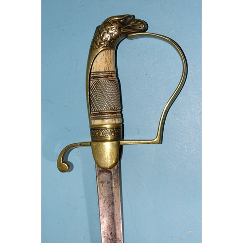 392 - An American officer's sword, the 75cm blade engraved with devices, canon and lances, the brass guard... 