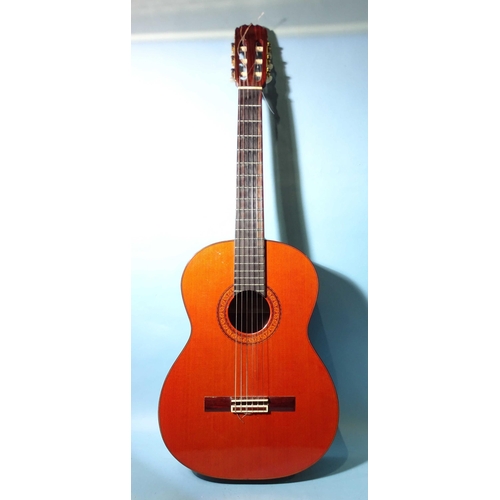 478 - A Japanese 6-string acoustic guitar with inlaid sound hole and stringing, labelled G S Arrav, model ... 