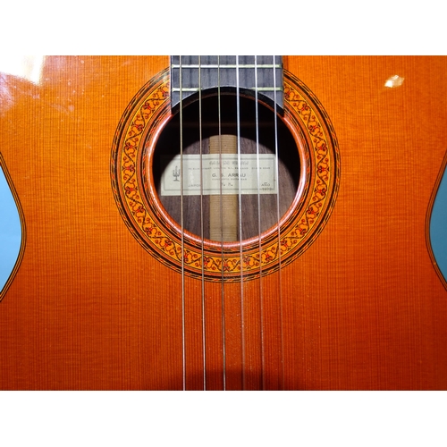 478 - A Japanese 6-string acoustic guitar with inlaid sound hole and stringing, labelled G S Arrav, model ... 