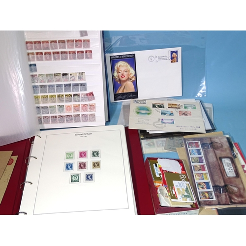 62 - An accumulation of stamps and covers in six albums and stock books and loose, with Great Britain min... 