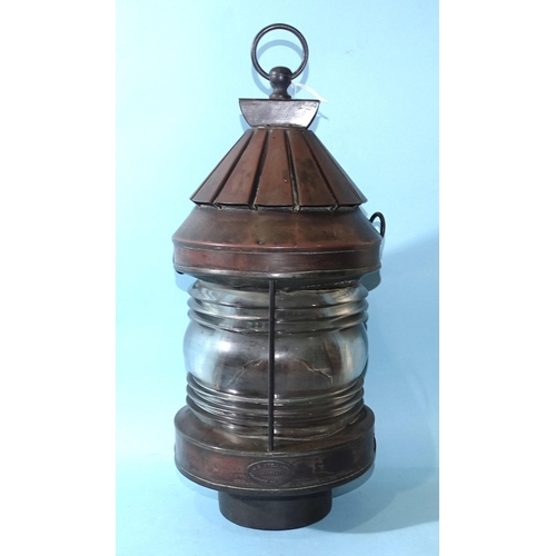 388 - J C Stelling, Amsterdam, a copper ship's lamp, 50cm high (including hanging loop).