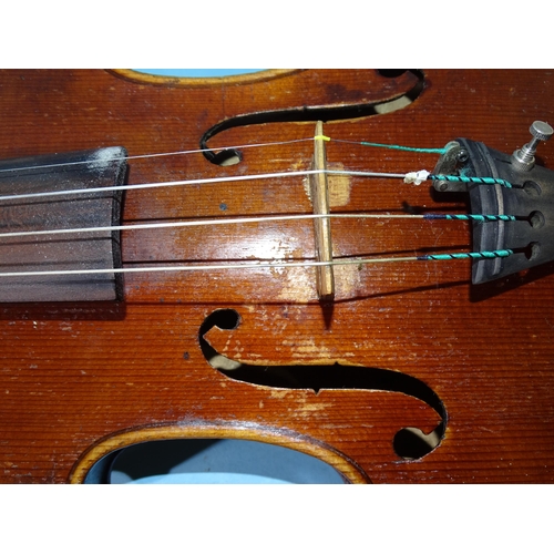 480A - An early-20th century full-size violin with two-piece back, with two bows, in case.