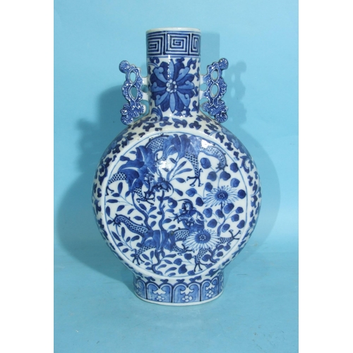 218 - A 19th century Chinese blue and white 'Dragon' moon flask, (slight bruise to rim), 26cm high.... 